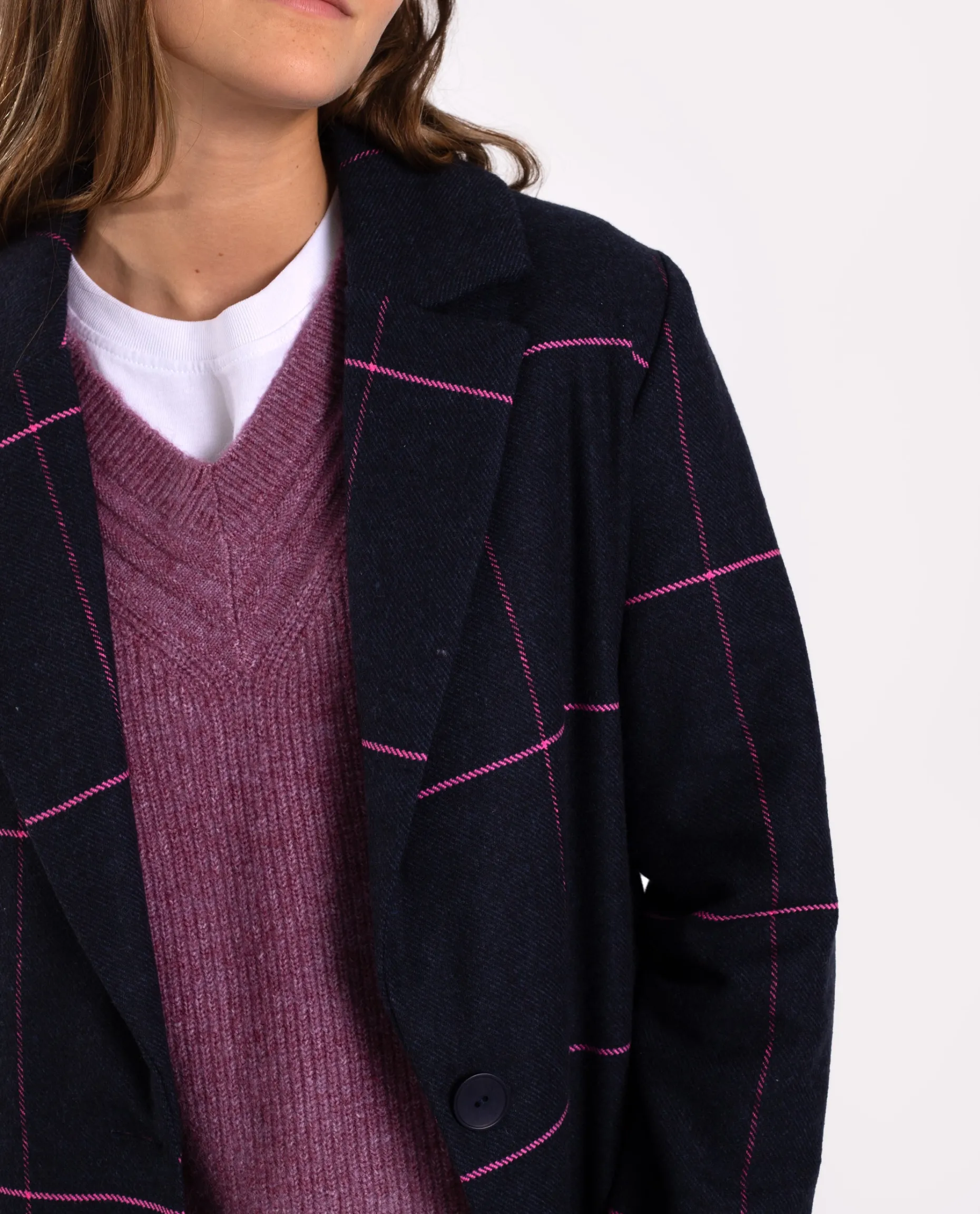 ABRIGO REUNITED · AZUL Y FUCSIA