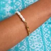 BRAZALETE CANE PEARLS · ACERO BAÑO ORO