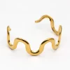 BRAZALETE WAVES · ACERO BAÑO ORO